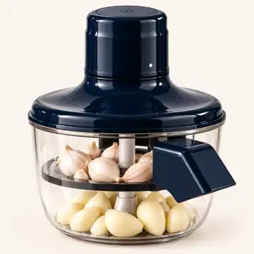Nooki, royal blue electric peeler filled with peeled garlic cloves